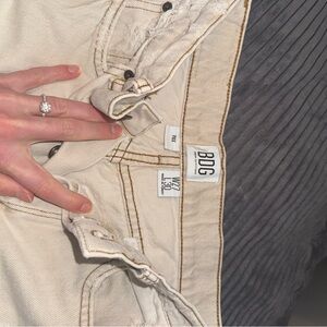 BDG Women's off white distressed Jeans